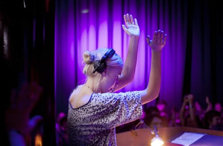 In this photo taken Tuesday March 20, 2012, DJ Jessie Granqvist at the Lunch Beat event at a cultural center in central Stockholm. 